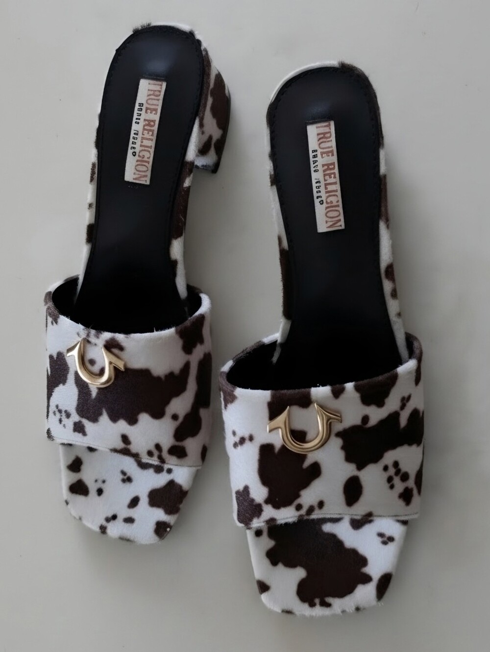 NEW! True Religion Cow-Print Slide Mules in Brown and White w/ Gold Horseshoe